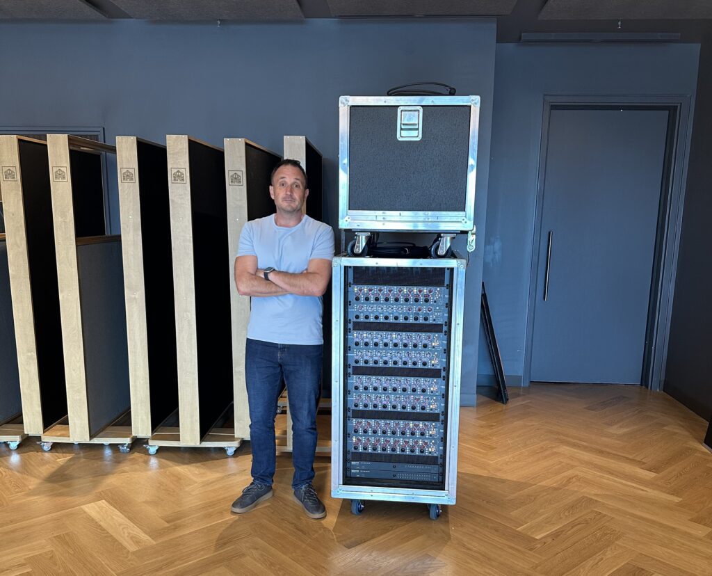 Doug McKendrick with the rolling 1073OPX rack in the Deane Cameron Recording Studio